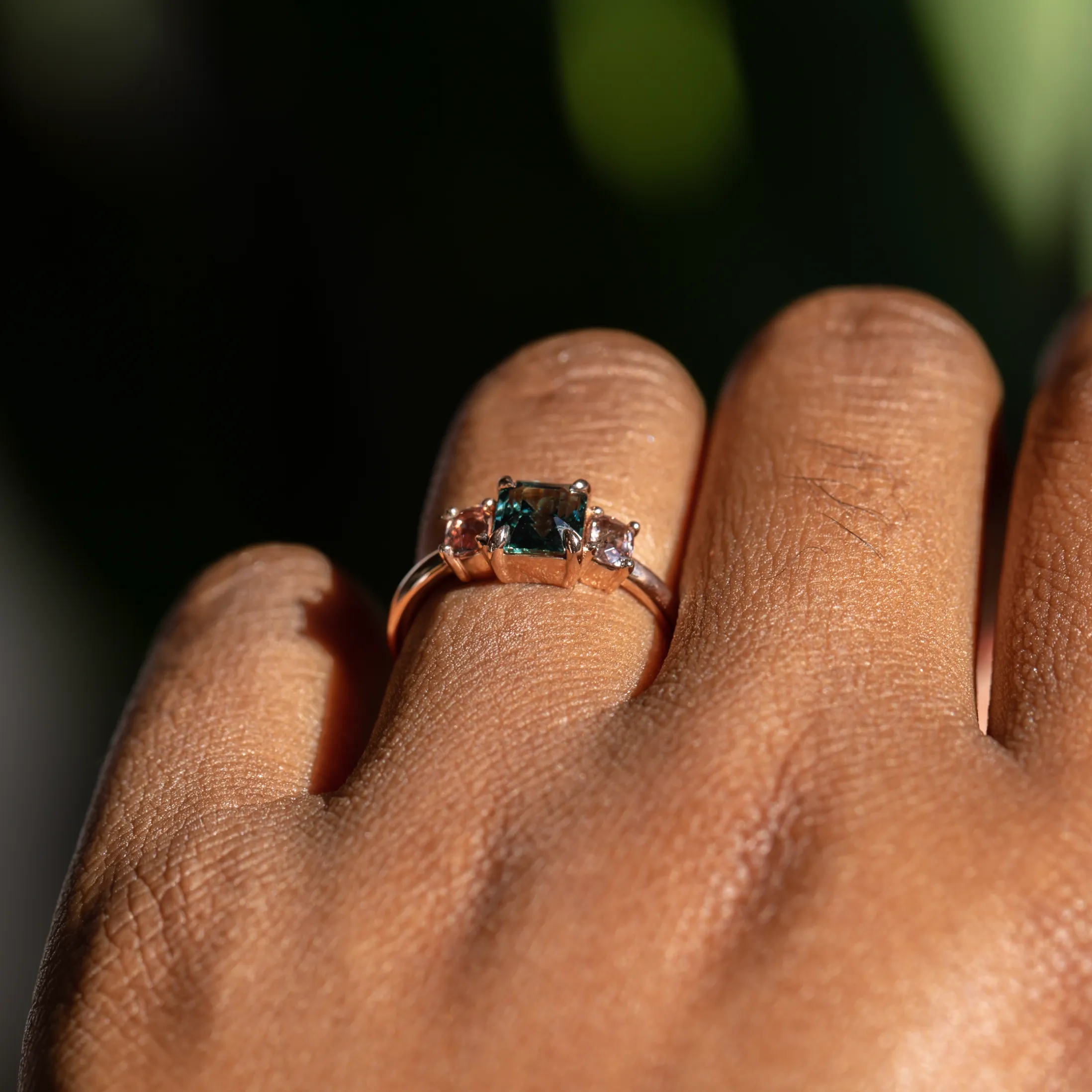 1.31ct Emerald cut sapphire and 0.47ct Pink Spinel Three Stone Ring in 14k Rose Gold