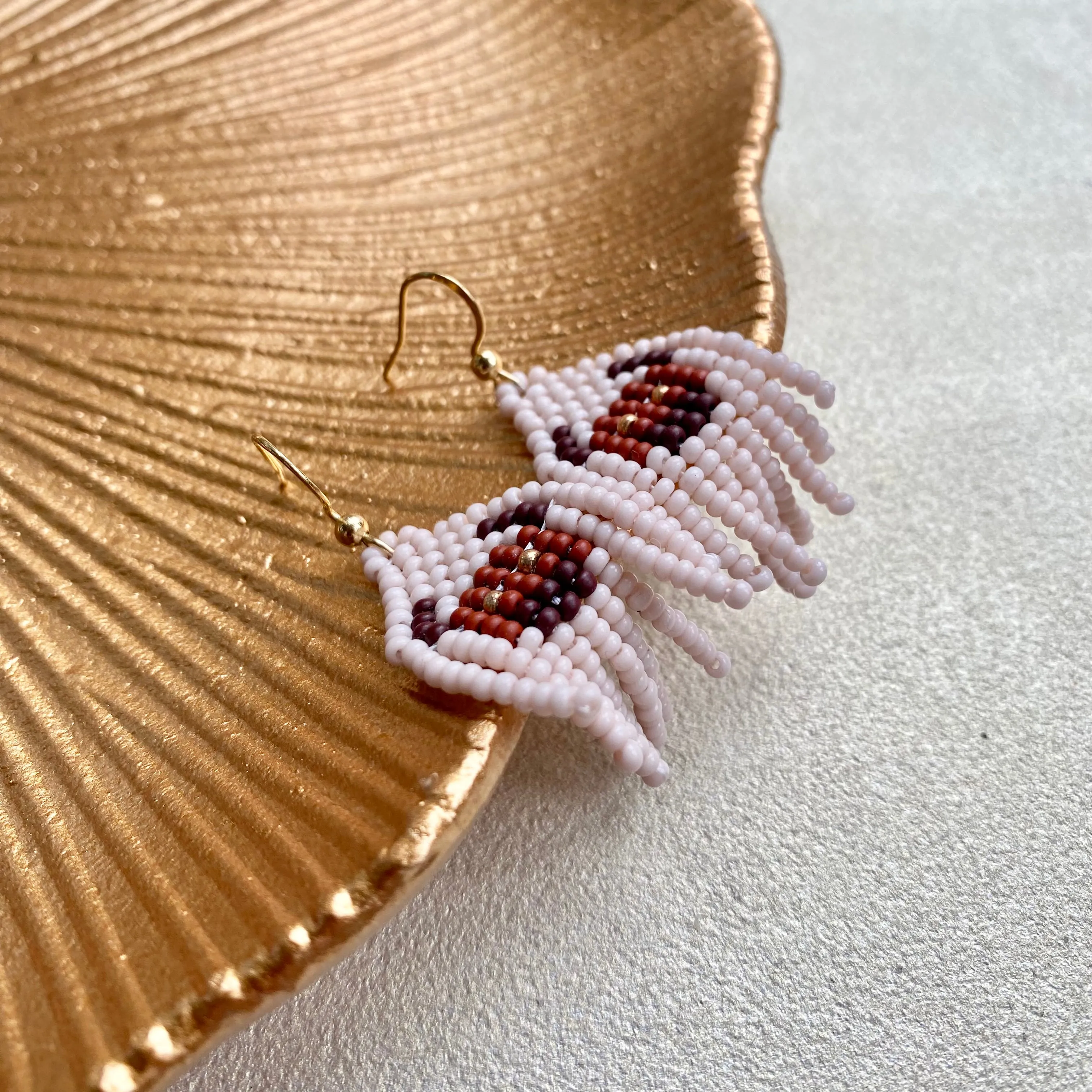 Cowgirl Earrings. Seed Bead Bull Earring for Women. Small Fringe Western earrings. Short Chandelier Earrings in boho hippie style.