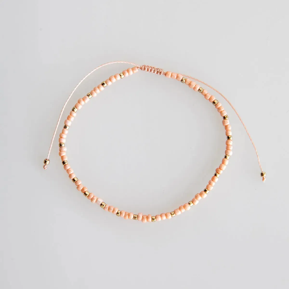 Delicate Pink and Gold Bead Bracelet