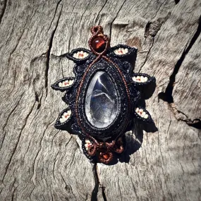 Negative quartz pendant